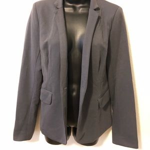 Grey blazer with polka dot lining